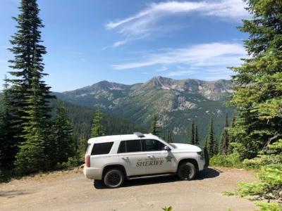 Patrol vehicle on top of a mountain